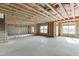 Unfinished basement with exposed framing and ample natural light at 2870 S Waterworks Rd, Buford, GA 30518