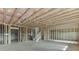 Unfinished basement with framing, showing potential for customization at 2870 S Waterworks Rd, Buford, GA 30518