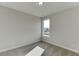 Simple bedroom with neutral walls and carpeted floors at 2870 S Waterworks Rd, Buford, GA 30518