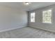 Spacious bedroom with neutral walls and carpet at 2870 S Waterworks Rd, Buford, GA 30518