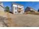 Rear view of two story house, showcasing a large backyard at 2870 S Waterworks Rd, Buford, GA 30518