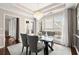 Dining room with a chandelier and large windows for lots of natural light at 992 Bridgegate Ne Dr, Marietta, GA 30068