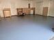 Finished garage space with smooth floors, storage closets and chest of drawers at 992 Bridgegate Ne Dr, Marietta, GA 30068