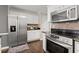 Kitchen with stainless steel refrigerator and oven at 992 Bridgegate Ne Dr, Marietta, GA 30068