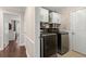 Convenient laundry room with modern appliances and ample storage space at 992 Bridgegate Ne Dr, Marietta, GA 30068