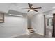 Unfinished basement with stairs and ceiling fan at 417 Crimson Maple Way, Smyrna, GA 30082