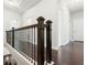 Upstairs hallway with dark hardwood floors and neutral walls at 417 Crimson Maple Way, Smyrna, GA 30082