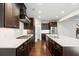 Modern kitchen with stainless steel appliances and granite countertops at 417 Crimson Maple Way, Smyrna, GA 30082