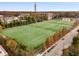 Aerial view of the soccer fields and surrounding wooded area of the community at 130 Arizona Ne Ave # 104, Atlanta, GA 30307