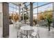 Bright lobby with floor to ceiling windows, concrete columns, minimalist lighting, and modern seating at 130 Arizona Ne Ave # 104, Atlanta, GA 30307