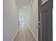 The home's foyer has light gray walls, white trim, and a light wood floor at 691 Sunstone Ln, Lawrenceville, GA 30043