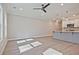 Open-concept living space featuring hardwood floors and recessed lighting at 691 Sunstone Ln, Lawrenceville, GA 30043