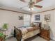 Bedroom features a ceiling fan, carpet, and neutral walls at 775 N Ola N Rd, Mcdonough, GA 30252