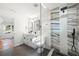 Modern bathroom with double vanity, large shower, and elegant tile at 1382 Almont Sw Dr, Atlanta, GA 30310