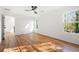 Spacious bedroom with hardwood floors and access to upper level at 1382 Almont Sw Dr, Atlanta, GA 30310