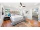 Main bedroom with ensuite bathroom and hardwood floors at 1382 Almont Sw Dr, Atlanta, GA 30310