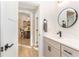 Modern bathroom with a floating vanity and quartz countertop at 241 Hembree Drive, Canton, GA 30115