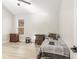 Bright bedroom with hardwood floors and a twin bed at 241 Hembree Drive, Canton, GA 30115