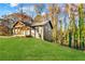 Gray house with a covered porch and grassy yard at 241 Hembree Drive, Canton, GA 30115