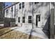 The backyard features a patio and exterior access to the home at 687 Sunstone Ln, Lawrenceville, GA 30043