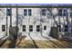 The backyard features a patio and exterior access to the home at 687 Sunstone Ln, Lawrenceville, GA 30043