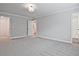 Spacious bedroom with carpet and en-suite bathroom at 687 Sunstone Ln, Lawrenceville, GA 30043
