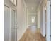 Bright foyer with light gray walls and wood-look floors at 113 Belvedere Rd, Mcdonough, GA 30253