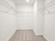 Walk-in closet with carpet and wire shelving at 685 Sunstone Ln, Lawrenceville, GA 30043