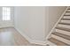 Stairway and entry door with hardwood flooring at 709 Trevett Way, Marietta, GA 30062