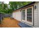 Private backyard with pine straw ground cover and french doors at 599 Quillian Ave., Decatur, GA 30032