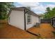 House exterior showcasing a clean, modern design with pine straw landscaping at 599 Quillian Ave., Decatur, GA 30032