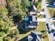 Aerial view of a house with a backyard and patio at 1721 Telfair Chase Way, Lawrenceville, GA 30043