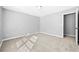 Simple bedroom with neutral walls and carpet at 1721 Telfair Chase Way, Lawrenceville, GA 30043