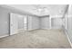 Large bedroom with double doors leading to a loft area at 1721 Telfair Chase Way, Lawrenceville, GA 30043