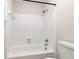 Clean bathroom with a white tiled shower and tub at 201 Granville Ct, Atlanta, GA 30328