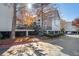 A well-maintained apartment complex with parking, landscaping, and exterior staircases for easy access to upper floors at 201 Granville Ct, Atlanta, GA 30328