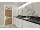 Bathroom featuring dual sinks, granite countertops, and tile floors at 271 Brooks Rackley Rd, Dallas, GA 30157