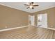 Bedroom with laminate floors, ceiling fan and ensuite bathroom access at 271 Brooks Rackley Rd, Dallas, GA 30157