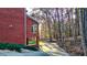 Long driveway leading to a brick home, surrounded by mature trees offering privacy and seclusion at 271 Brooks Rackley Rd, Dallas, GA 30157