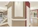 Foyer shows staircase and entry to a room featuring a red accent wall at 271 Brooks Rackley Rd, Dallas, GA 30157