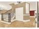 Spacious foyer with hardwood floors, staircase, and neutral wall colors provides a warm welcome at 271 Brooks Rackley Rd, Dallas, GA 30157