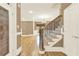 Inviting foyer with hardwood floors, staircase, leading to an open living space at 271 Brooks Rackley Rd, Dallas, GA 30157