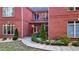 Charming front entrance with double doors and well-maintained landscaping, set in a red brick facade at 271 Brooks Rackley Rd, Dallas, GA 30157