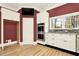 Gourmet kitchen with stainless steel appliances, white cabinetry, stone countertops, and a TV at 271 Brooks Rackley Rd, Dallas, GA 30157