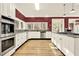 Gourmet kitchen with stainless steel appliances, custom cabinets, and granite countertops at 271 Brooks Rackley Rd, Dallas, GA 30157