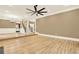 Spacious living room with hardwood floors, staircase, neutral wall colors, and a chandelier at 271 Brooks Rackley Rd, Dallas, GA 30157