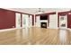 Spacious living room with fireplace and TV; enhanced by natural light and beautiful hardwood floors at 271 Brooks Rackley Rd, Dallas, GA 30157