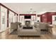Comfortable living room with fireplace, built-in shelves, and access to the outdoors through french doors at 271 Brooks Rackley Rd, Dallas, GA 30157