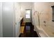 Spa-like bathroom with a soaking tub and dark wood flooring at 3554 Umatilla Sw Ln, South Fulton, GA 30331