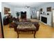 Large living room with hardwood floors and a cozy fireplace at 3554 Umatilla Sw Ln, South Fulton, GA 30331